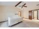 Spacious bedroom with high ceiling and ceiling fan at 11275 Ranch Pl, Denver, CO 80234