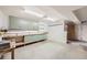 Workshop with built-in cabinets and a large workspace at 11275 Ranch Pl, Denver, CO 80234