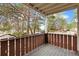 Balcony with wooden railing overlooking trees at 8060 Niwot Rd # 38, Niwot, CO 80503