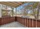 Balcony with wooden railing overlooking parking area at 8060 Niwot Rd # 38, Niwot, CO 80503
