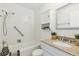 Clean bathroom featuring a shower and tub combo, tile surround, and granite countertop at 8060 Niwot Rd # 38, Niwot, CO 80503