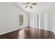 Vaulted ceiling bedroom with wood floors, a ceiling fan, a window with natural light and a closet at 8060 Niwot Rd # 38, Niwot, CO 80503
