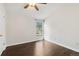 Bedroom with hardwood floors, neutral walls, and a window providing plenty of natural light at 8060 Niwot Rd # 38, Niwot, CO 80503