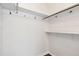 Bright walk-in closet featuring rod, hooks and shelving at 8060 Niwot Rd # 38, Niwot, CO 80503