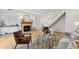 Cozy living room with a fireplace, hardwood floors, and a staircase at 8060 Niwot Rd # 38, Niwot, CO 80503