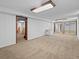 Finished basement offers additional living space with mirrored walls at 28735 Little Big Horn Dr, Evergreen, CO 80439