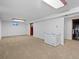 Spacious finished basement with neutral carpeting and ample storage at 28735 Little Big Horn Dr, Evergreen, CO 80439