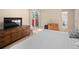 Bedroom with sliding glass door, natural light, and wood furnishings at 28735 Little Big Horn Dr, Evergreen, CO 80439