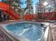 Enjoy this hot tub on a sunny deck in the woods at 28735 Little Big Horn Dr, Evergreen, CO 80439