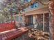 Charming house entrance with stone and wood accents at 28735 Little Big Horn Dr, Evergreen, CO 80439