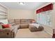 Relaxing living room with sectional couch and window at 28735 Little Big Horn Dr, Evergreen, CO 80439