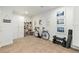 Finished basement area with home gym and storage at 1217 E 26Th Ave, Denver, CO 80205