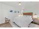 Bright bedroom with cozy sitting area and large bed at 1217 E 26Th Ave, Denver, CO 80205