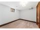 Cozy bedroom boasts neutral walls, plush carpet, and a window that provides natural light at 1376 S Clayton St, Denver, CO 80210