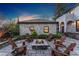 Charming outdoor fire pit with Adirondack chairs, perfect for cozy evenings and outdoor gatherings at 1376 S Clayton St, Denver, CO 80210