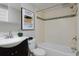 Bathroom with a bathtub and subway tile surround at 1149 Columbine St # 104, Denver, CO 80206