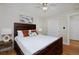 Bright bedroom with double bed, wood floors, and large closet at 1149 Columbine St # 104, Denver, CO 80206