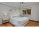 Bright bedroom with hardwood floors and ceiling fan at 1149 Columbine St # 104, Denver, CO 80206