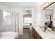 Main bathroom with soaking tub, shower, and double sinks at 9053 W 103Rd Ave, Broomfield, CO 80021