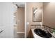 Small powder room with black sink at 9053 W 103Rd Ave, Broomfield, CO 80021