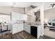 Modern kitchen with gray cabinets and white quartz countertops at 9053 W 103Rd Ave, Broomfield, CO 80021