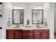 Bathroom featuring a double sink vanity with granite countertop at 9586 Silent Hills Ln, Lone Tree, CO 80124