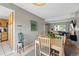 The dining room has an open concept with a living room, plenty of natural light at 3571 S Kittredge St # C, Aurora, CO 80013