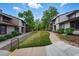 Charming townhomes with landscaped grounds and walkway at 3571 S Kittredge St # C, Aurora, CO 80013