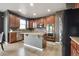Modern kitchen with stainless steel appliances and a center island at 2015 E 167Th Ln, Thornton, CO 80602