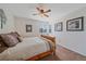 Serene bedroom features a comfortable bed, soft carpet, and calming decor at 10421 Kennemere Ln, Parker, CO 80134