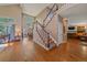 Grand entryway featuring a staircase and soaring ceilings at 10421 Kennemere Ln, Parker, CO 80134