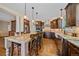 Beautiful kitchen featuring an island with seating and ample counter space at 10421 Kennemere Ln, Parker, CO 80134