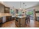 Gourmet kitchen with granite countertops and center island at 10421 Kennemere Ln, Parker, CO 80134