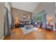 Spacious living room with vaulted ceilings and hardwood floors at 10421 Kennemere Ln, Parker, CO 80134