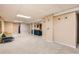 Spacious finished basement with carpet, providing a versatile space for various activities at 6661 Lamar St, Arvada, CO 80003