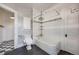 Bright bathroom featuring tiled shower/tub, modern toilet, and dark floors at 1057 N Emerson St # B, Denver, CO 80218