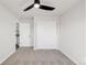 Bedroom with neutral carpeting, ceiling fan and closet at 11304 Elm Dr, Thornton, CO 80233