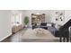 Bright living room with hardwood floors, modern furniture, and stylish decor and lots of light at 11304 Elm Dr, Thornton, CO 80233