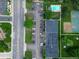 This aerial view showcases the parking, pool, basketball courts and the building's proximity to city streets at 9650 Huron St # 3, Thornton, CO 80260