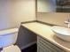 Modern bathroom featuring stylish vanity, vessel sink, and a large mirror at 9650 Huron St # 3, Thornton, CO 80260