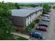Apartment building showcasing brick facade, neutral siding, and ample parking in a landscaped setting at 9650 Huron St # 3, Thornton, CO 80260