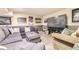Basement design featuring an entertainment area and decor at 2238 S Nome Ct, Aurora, CO 80014