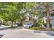 Charming two-story home with brick accents, driveway, and mature landscaping at 2238 S Nome Ct, Aurora, CO 80014