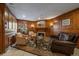 Cozy lobby area with wood paneling, a fireplace, and comfortable seating at 700 N Washington St # 402, Denver, CO 80203