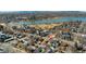 Aerial view of the home and neighborhood near a large lake, showcasing the community layout at 2038 Meade St, Denver, CO 80211