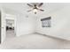 Bright bedroom featuring neutral walls, carpet, modern ceiling fan, and window at 2038 Meade St, Denver, CO 80211