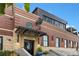 Charming brick building with a decorative awning and clear signage at 2038 Meade St, Denver, CO 80211