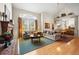 Open concept living and dining area boasts tall ceilings and a large window at 3795 W 104Th Dr # E, Westminster, CO 80031