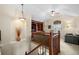 Upstairs loft with built-in bookcase, comfortable seating and natural light at 3795 W 104Th Dr # E, Westminster, CO 80031