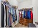 Large walk-in closet with hanging racks and built-in drawers at 3795 W 104Th Dr # E, Westminster, CO 80031